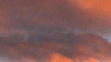 Should You Pay Off Debt or Travel With Partner