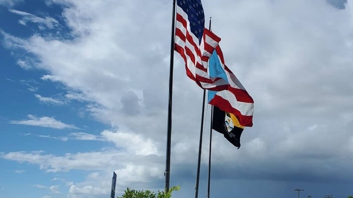 Puerto Rican and American flags