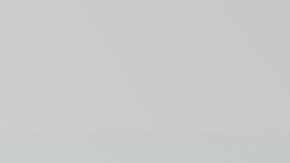 A braider at Eve's African Braiding in College Park, Ga., feeds in synthetic braiding hair while styling client Sadajah Herring's hair into knotless braids, Tuesday, May 6, 2025. (AP Photo/Stephanie Scarbrough)